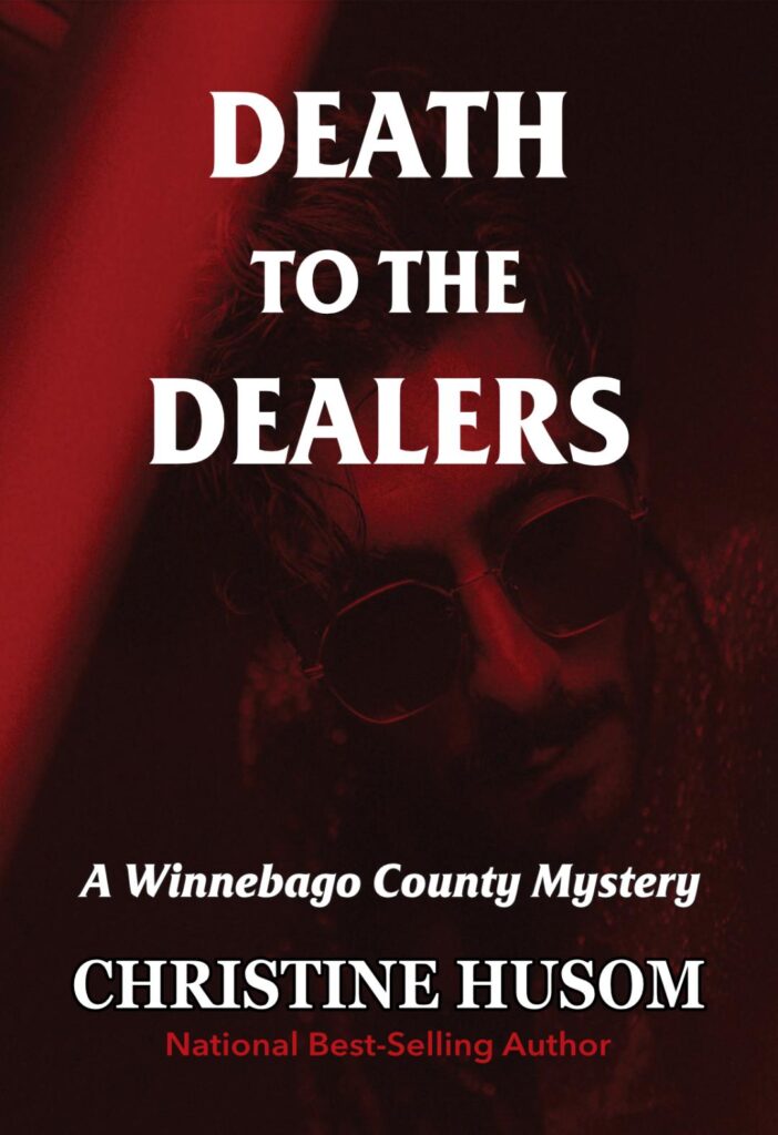 Front cover of book Death to the Dealers, A Winnebago County Mystery by Christine Husom front cover